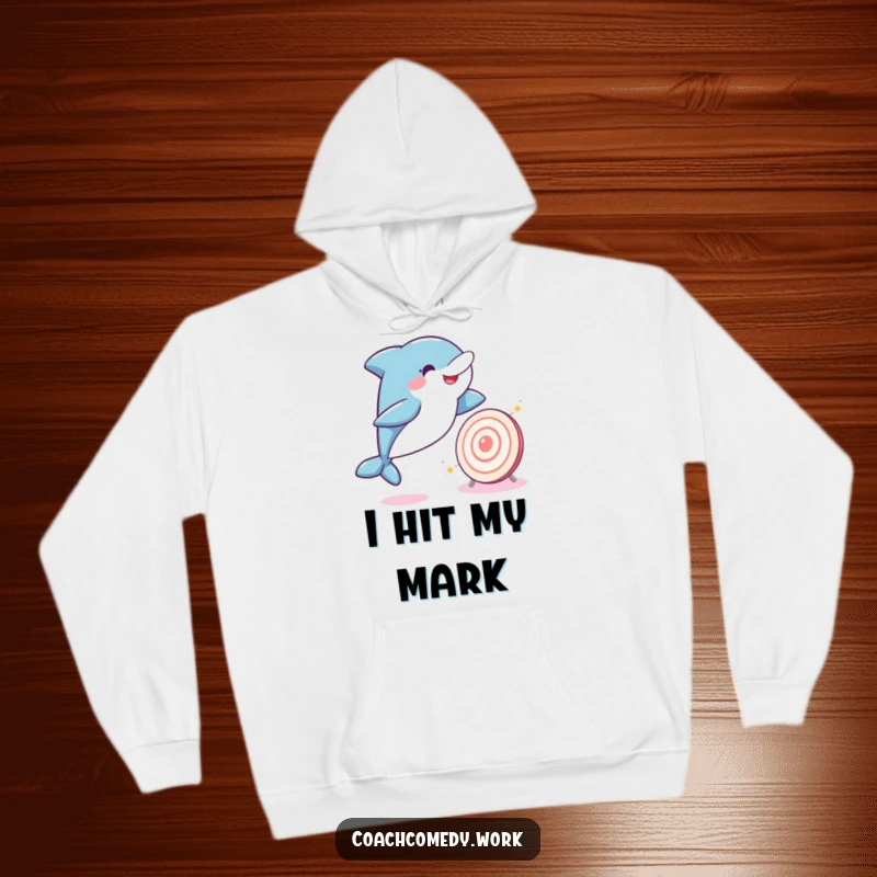 Funny Kawaii dolphin in a joyful leap towards a sparkling target, featured on a cozy hoodie. A humorous and warm apparel choice.